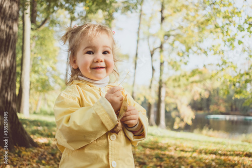 Caucasian girl child portrait in autumn garden © gesrey