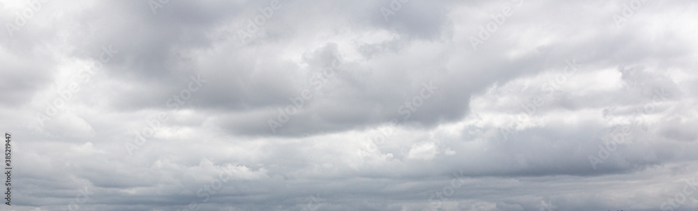 Image of a dark and cloudy sky during the day Image of a dark and cloudy sky during the day