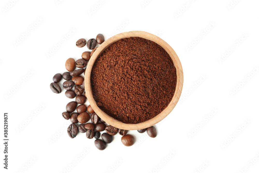 Wooden bowl with ground coffee isolated on white background Wooden bowl with ground coffee isolated on white background