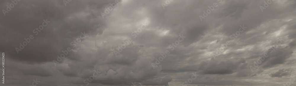 Image of a dark and cloudy sky during the day Image of a dark and cloudy sky during the day