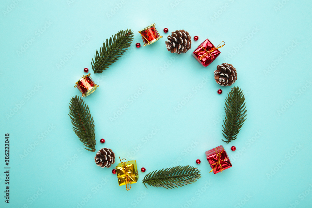 Christmas wreath on blue background. Christmas composition