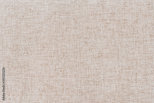 Fotografie White, beige flaxen background. Fabric or texture