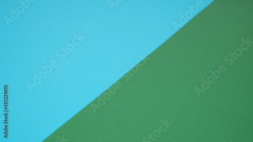 Empty paper in green and blue color for background.