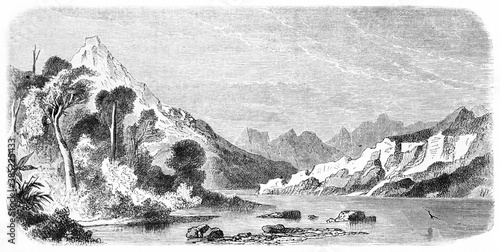 horizontal oriented engraving of placid bay of Port Galant at the end of Saint Nicholas Bay, Chile. Ancient grey tone etching style art by De B�rard, published on Le Tour du Monde, Paris, 1861 photo