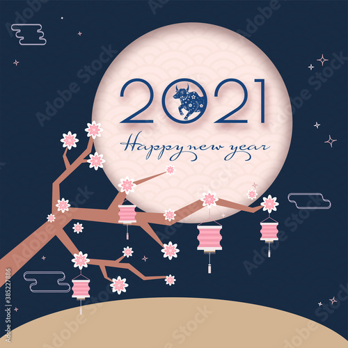 2021 Happy New Year Text with Chinese Zodiac Ox Sign and Flower Branch Decorated by Lanterns on Full Moon Blue Background.