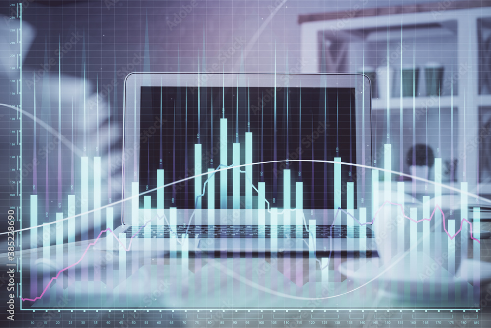Forex market chart hologram and personal computer background. Multi exposure. Concept of investment. Forex market chart hologram and personal computer background. Multi exposure. Concept of investment.