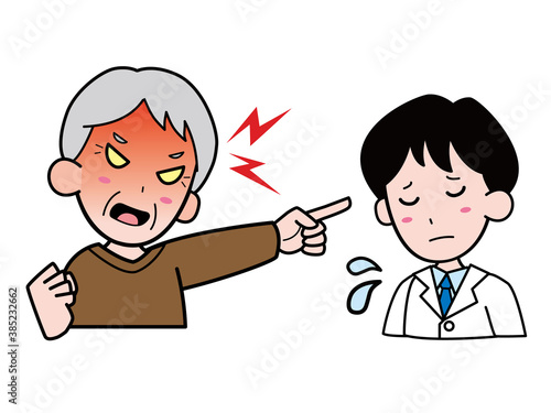 白衣姿の若い男性を怒鳴りつけるおじいさん