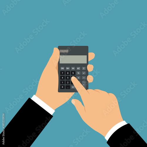 The hand of a manager or businessman holding a black calculator with a blank gray screen. He clicks on the number buttons with his index finger. Space for text, vector