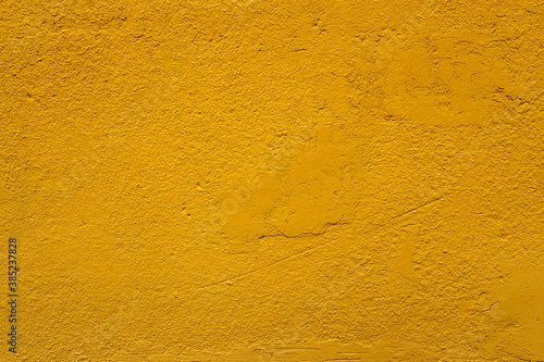 Yellow abstract concrete and cement textured background