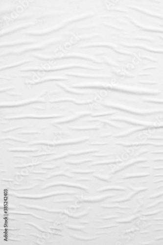 Blank white crumpled and creased paper poster texture background