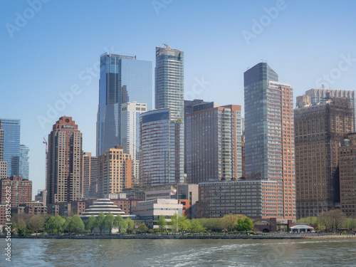 Shot of the skyline of New York City from the Hudson river  with skyscrapers of the downtown district and Wall Street