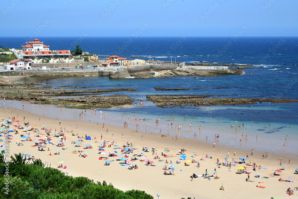 Sunny beach of Comillas on the Bay of Biscay, Cantabria, Spain