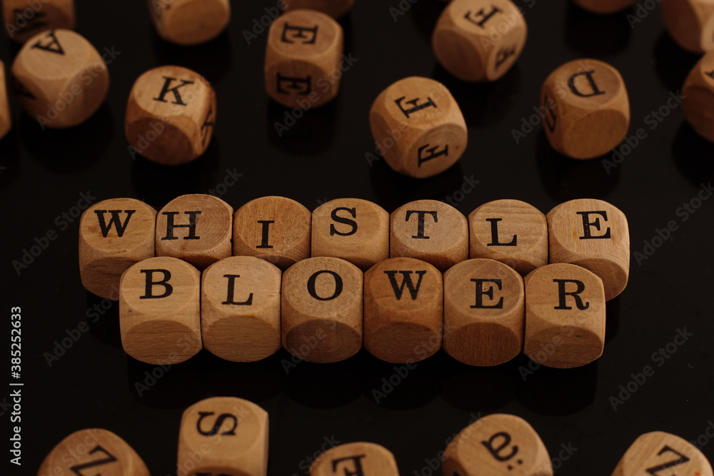 Wooden blocks with the word Whistleblower Wooden blocks with the word Whistleblower