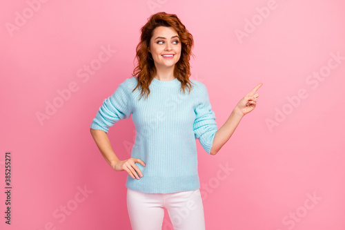 Portrait of her she nice-looking attractive lovely pretty cute cheerful cheery wavy-haired girl showing copy space advert decision solution isolated over pink pastel color background
