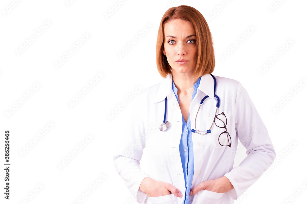 Female doctor studio portrait while standing at isolated white background Female doctor studio portrait while standing at isolated white background
