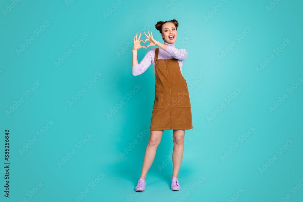 Full size photo of attractive charming girlfriend lady send love boyfriend congratulate anniversary hold arms heart shape wear fall outfit two cute buns isolated turquoise color background Full size photo of attractive charming girlfriend lady send love boyfriend congratulate anniversary hold arms heart shape wear fall outfit two cute buns isolated turquoise color background