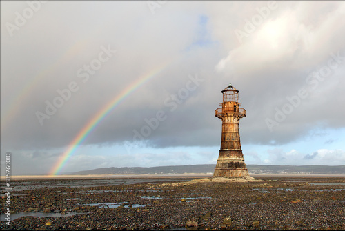 Whiteford Lighthouse is listed by Cadw as Grade II* A wave-swept cast-iron lighthouse in British coastal waters and an important work of cast-iron engineering and nineteenth-century architecture Fototapet