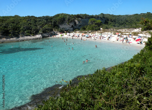  In the southern corner of Corsica there is the small Sperone beach  well protected between two headlands. The sand is very fine  the water is clear and turquoise.                              