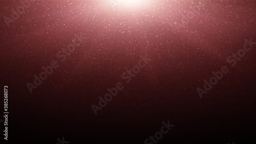White particles illuminated by red light from above, lens flare
