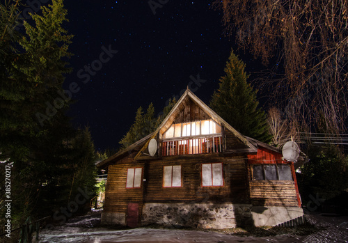 Wooden cabin at night