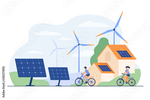 Active people on bikes, windmills and house with solar panel on rooftop flat vector illustration. Cartoon characters living healthy lifestyle. Renewable energy and smart technology concept