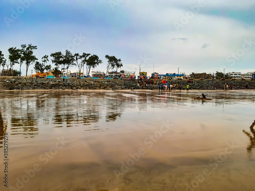 A beautiful view of the long sea in the India state of west bengal at sunset.