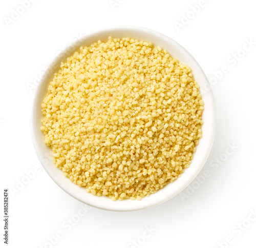 Bowl of couscous isolated on white, from above