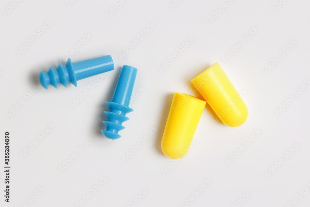 Two tipes of earplugs isolated on white