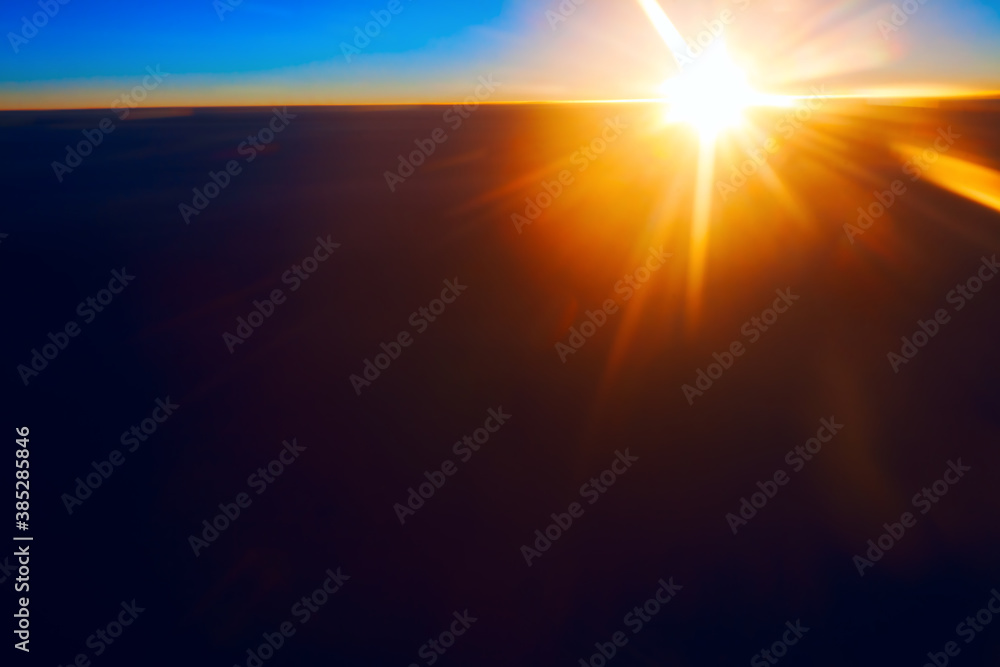 Sun above dark clouds . Fantastic sunlight view from a high height Sun above dark clouds . Fantastic sunlight view from a high height