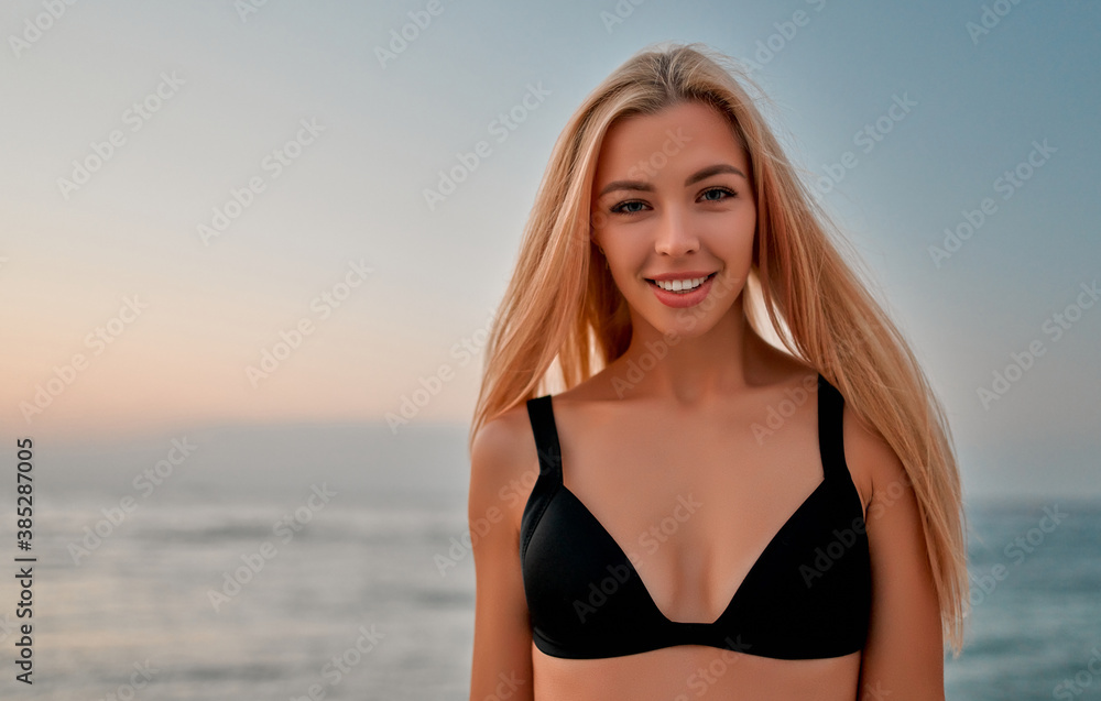 Woman in swimsuit on the beach