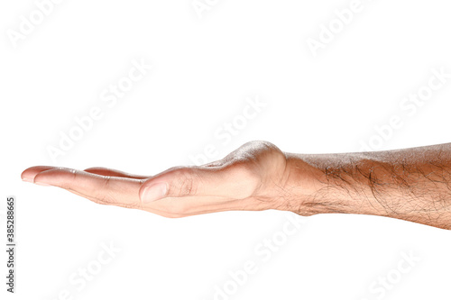 isolated of male caucasian hand holding something like a bottle or can.