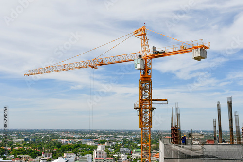The Crane tower in construction  site of a high-rise condominium.