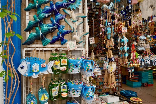 Bodrum, Turkey - August, 2020: Shops for tourists. Authentic goods for travelers. Souvenirs in Bodrum. Oriental flavor and exotic. Popular tourist destination, famous Turkish bazaar.