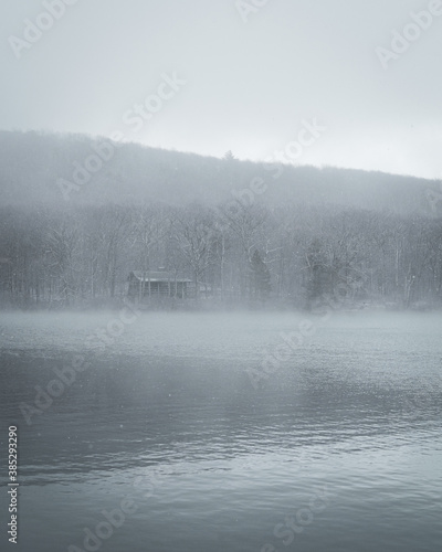 Fog and snow at Steeny Kill Lake, in High Point State Park, New Jersey