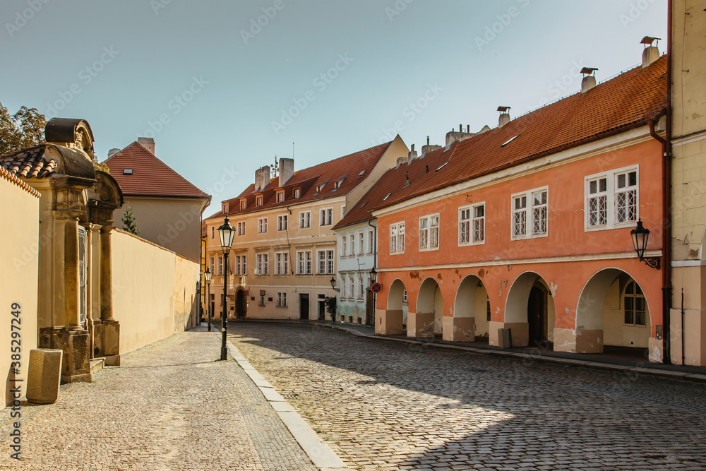 Empty street with colorful houses in Prague,Czech capital. No tourists,no sightseeing during COVID 19 quarantine,September 2020.Historical centre without people.Amazing European cityscape Empty street with colorful houses in Prague,Czech capital. No tourists,no sightseeing during COVID 19 quarantine,September 2020.Historical centre without people.Amazing European cityscape