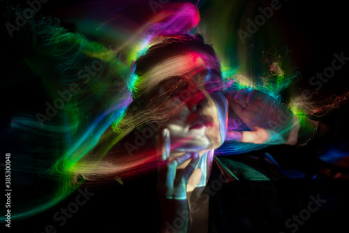 Girl in colored neon light, light painting