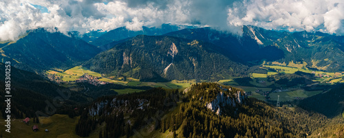 High resolution stitched panorama of a beautiful alpine view with dramatic clouds at the famous Wendelstein near Bayrischzell, Bavaria, Germany