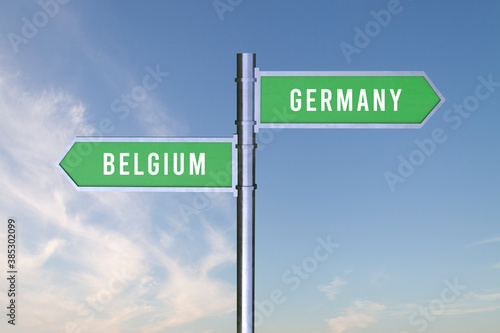 Sign indicating the direction of the borders between two countries Belgium, Germany , 3d render.