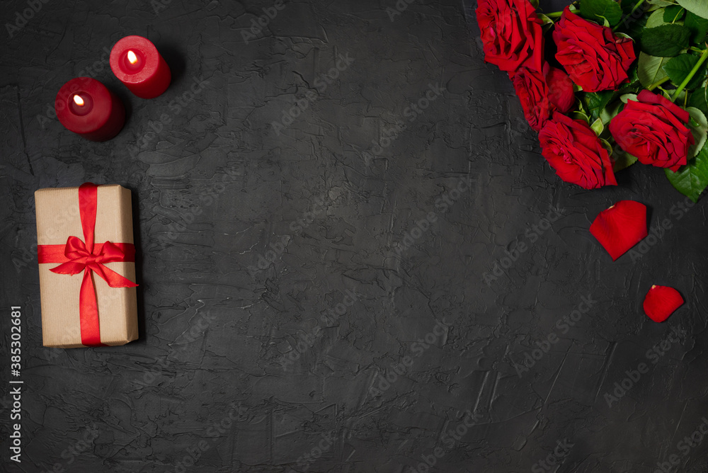 Red roses bouquet on the black stone background. Dark beautiful festive and romantic banner Red roses bouquet on the black stone background. Dark beautiful festive and romantic banner
