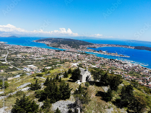 TROGIR, CROATIA, June 2020. Aerial view of Trogir and Čiovo island in Dalmatia. Adriatic sea and clear blue sky. photo