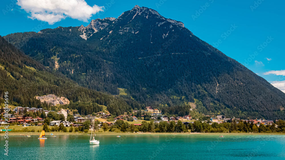 Beautiful alpine view with reflections at the famous Achensee, Pertisau, Tyrol, Austria