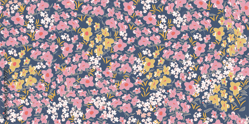 Blooming midsummer meadow seamless pattern. Plant background for fashion, wallpapers, print. A lot of different flowers on the field. Liberty style. Trendy floral design