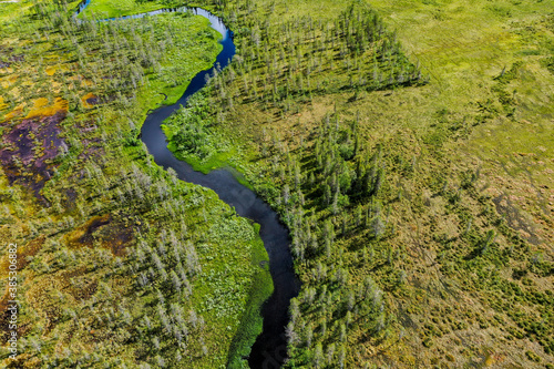 Aerial view of river and forest in Finnish Lapland