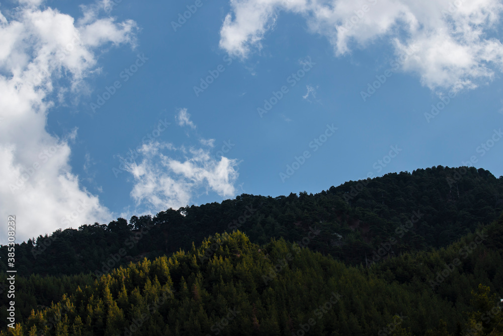 The perfect harmony of mountain and cloud with the sky The perfect harmony of mountain and cloud with the sky