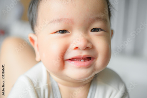 11 months baby boy portrait  asian kid face  little boy smiling