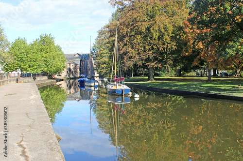 Boats reflected in the River Dart at Totnes	