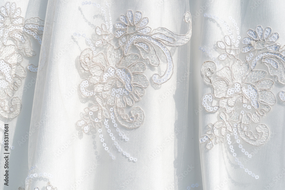 white wedding dress fashion close up floral ornament silk