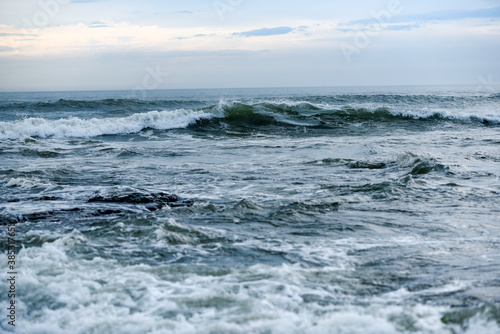 Fototapeta Naklejka Na Ścianę i Meble -  A rough ocean, rough waves on the ocean off the coast of France.