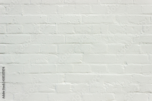 Texture white brick wall background texture. Fragment of a house wall