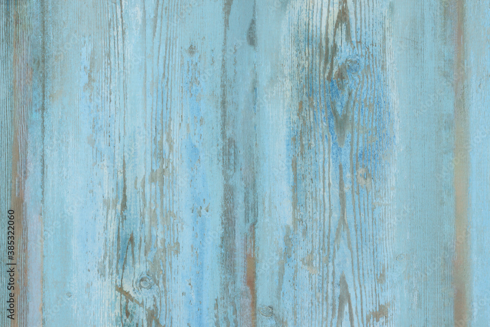 Watercolor blue wood background. Light blue wood texture of pine board with knots. Blue washed wood texture. Wood table top view. Watercolor blue wood background. Light blue wood texture of pine board with knots. Blue washed wood texture. Wood table top view.